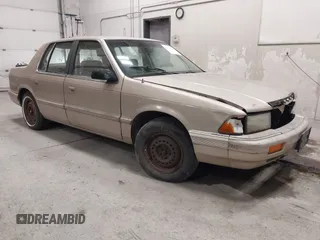 1991 Dodge Spirit z VIN 1B3XA46KXMF519542, wystawiony jako IAAI lot #42278204 z przebiegiem 134 919 mil mil oraz . Historia ofert i sprzedaży dostępna na DreamBid. Obrazek 1.