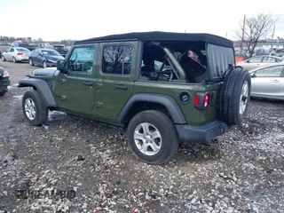 2021 Jeep Wrangler Unlimited Sport S with VIN 1C4HJXDG1MW836029, listed as a IAAI auction lot 41811840 with 34,992 mi miles. Bid and sale history available at carsss.com. Image 3.
