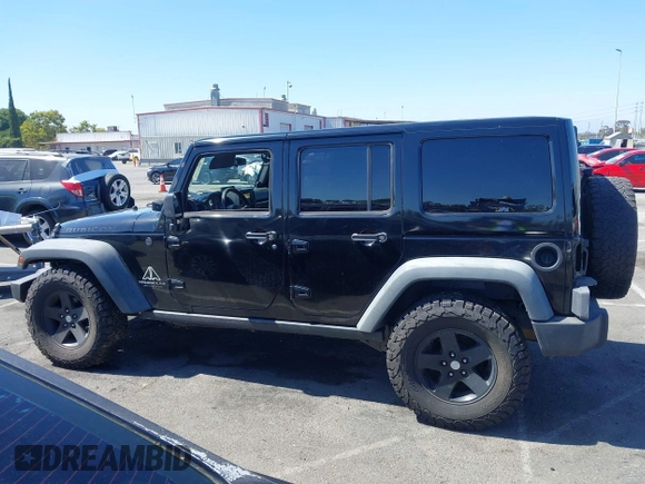 2008 Jeep Wrangler Unlimited Rubicon with VIN 1J8GA69108L574773, listed as a IAAI auction lot 42714300 with 106,974 mi miles and . Bid and sale history available at DreamBid. Image 14.