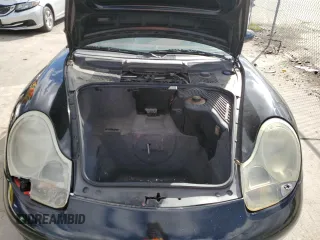 2000 Porsche Boxster z VIN WP0CA2988YU627807, wystawiony jako Copart lot #45522955 z przebiegiem 120 384 mil mil oraz Szkody całkowita. Historia ofert i sprzedaży dostępna na DreamBid. Obrazek 11.