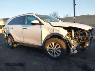 2018 Kia Sorento LX with VIN 5XYPG4A52JG354741, listed as a IAAI auction lot 41626561 with 91,242 mi miles and . Bid and sale history available at DreamBid. Image 6.