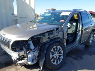 2020 Jeep Cherokee Latitude Plus with VIN 1C4PJLLB5LD521965, listed as a IAAI auction lot 41232028 with 77,729 mi miles. Bid and sale history available at carsss.com. Image 6.