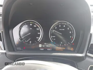 2021 BMW X1 xDrive28i with VIN WBXJG9C05M5T83784, listed as a IAAI auction lot 41696073 with 15,865 mi miles and . Bid and sale history available at DreamBid. Image 7.