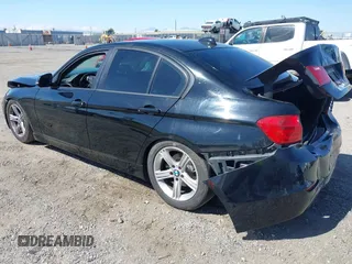 2015 BMW 3 Series 320i with VIN WBA3B1C57FK138441, listed as a IAAI auction lot 42034649 with Not Provided miles. Bid and sale history available at carsss.com. Image 3.