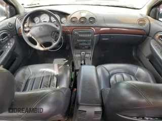 2000 Chrysler 300M M with VIN 2C3HE66G9YH383296, listed as a Copart auction lot 52339395 with 128,842 mi miles and Salvage Title. Bid and sale history available at DreamBid. Image 8.