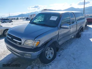 2002 Toyota Tundra SR5 with VIN 5TBBT44192S225410, listed as a IAAI auction lot 41402257 with 218,842 mi miles. Bid and sale history available at carsss.com. Image 6.