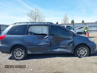 2009 Toyota Sienna XLE with VIN 5TDBK22C69S027767, listed as a IAAI auction lot 42029832 with 200,752 mi miles and . Bid and sale history available at DreamBid. Image 13.