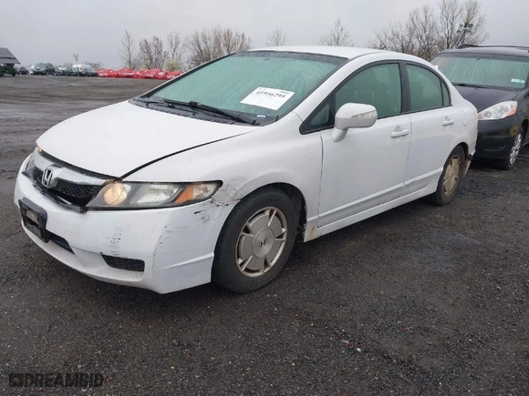 2010 Honda Civic Hybrid with VIN JHMFA3F23AS005117, listed as a IAAI auction lot 41956295 with 211,151 mi miles. Bid and sale history available at carsss.com. Image 2.