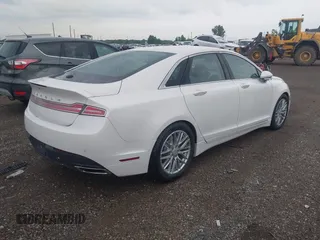 2016 Lincoln MKZ with VIN 3LN6L2JK9GR609137, listed as a IAAI auction lot 42679691 with 125,180 mi miles and . Bid and sale history available at DreamBid. Image 4.