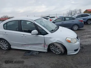 2010 Suzuki SX4 with VIN JS2YC5A43A6300225, listed as a IAAI auction lot 41654094 with 60,098 mi miles and . Bid and sale history available at DreamBid. Image 6.