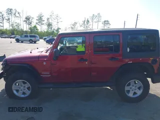 2011 Jeep Wrangler Unlimited Sport with VIN 1J4BA3H18BL598323, listed as a IAAI auction lot 41958043 with 154,354 mi miles. Bid and sale history available at carsss.com. Image 14.