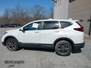 2020 Honda CR-V EX z VIN 2HKRW2H59LH619611, wystawiony jako IAAI lot #39701178 z przebiegiem 27 088 mil mil oraz . Historia ofert i sprzedaży dostępna na DreamBid. Obrazek 13.