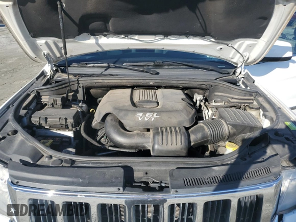 2013 Jeep Grand Cherokee Laredo with VIN 1C4RJEAG0DC636922, listed as a Copart auction lot 48796115 with 151,295 mi miles and Salvage Title. Bid and sale history available at carsss.com. Image 12.