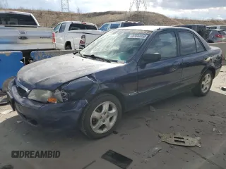 2000 Mazda Protege ES with VIN JM1BJ2210Y0296401, listed as a Copart auction lot 87844455 with 163,970 mi miles and Salvage Title. Bid and sale history available at DreamBid. Image 1.