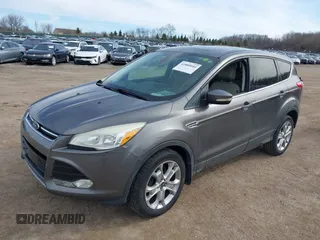 2013 Ford Escape SEL with VIN 1FMCU0HX0DUD71088, listed as a IAAI auction lot 41880044 with 155,439 mi miles. Bid and sale history available at carsss.com. Image 17.