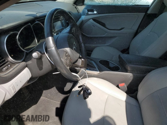 2015 Kia Optima EX with VIN 5XXGN4A7XFG478615, listed as a Copart auction lot 50950514 with 57,003 mi miles and Salvage Title. Bid and sale history available at DreamBid. Image 7.
