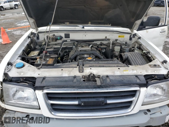 1999 Isuzu Trooper S z VIN JACDJ58XXX7922000, wystawiony jako Copart lot #48209835 z przebiegiem 127 024 mil mil oraz Szkoda całkowita • Salvage title. Historia ofert i sprzedaży dostępna na DreamBid. Obrazek 13.