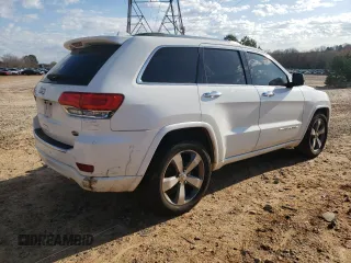 2015 Jeep Grand Cherokee High Altitude with VIN 1C4RJECG4FC654789, listed as a Copart auction lot 49378875 with 163,192 mi miles and Salvage Title. Bid and sale history available at carsss.com. Image 3.