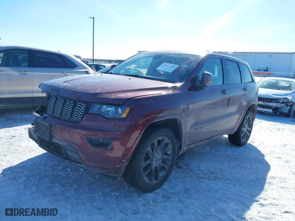 2019 Jeep Grand Cherokee Laredo E with VIN 1C4RJFAG1KC802450, listed as a IAAI auction lot 41617468 with 95,318 mi miles. Bid and sale history available at carsss.com. Image 2.
