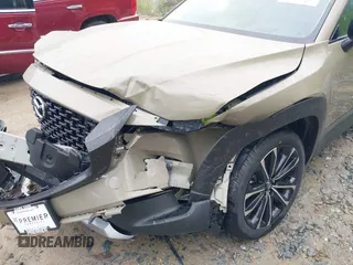 2025 Mazda CX-50 Premium z VIN 7MMVABDY2SN339010, wystawiony jako IAAI lot #42201002 z przebiegiem 36 mil mil oraz . Historia ofert i sprzedaży dostępna na DreamBid. Obrazek 17.
