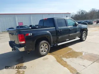 2013 GMC Sierra 1500 SLT with VIN 3GTP2WE71DG146605, listed as a IAAI auction lot 41334159 with 224,640 mi miles and . Bid and sale history available at DreamBid. Image 4.