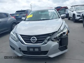 2016 Nissan Altima S z VIN 1N4AL3AP7GN349989, wystawiony jako IAAI lot #42074440 z przebiegiem 123 059 mil mil oraz . Historia ofert i sprzedaży dostępna na DreamBid. Obrazek 12.