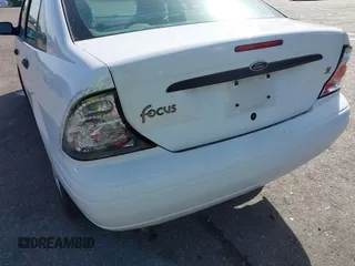 2003 Ford Focus with VIN 1FAHP34393W131102, listed as a IAAI auction lot 41703826 with 188,029 mi miles and . Bid and sale history available at DreamBid. Image 6.