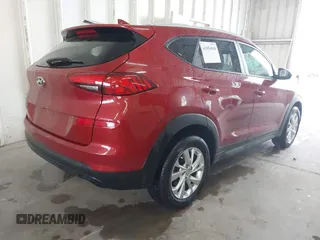 2021 Hyundai Tucson Value with VIN KM8J33A44MU363524, listed as a IAAI auction lot 41854508 with 59,821 mi miles. Bid and sale history available at carsss.com. Image 4.