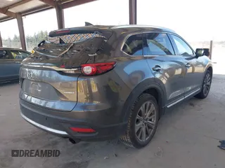 2021 Mazda CX-9 Signature with VIN JM3TCBEY9M0504963, listed as a IAAI auction lot 41756255 with 49,946 mi miles. Bid and sale history available at carsss.com. Image 4.