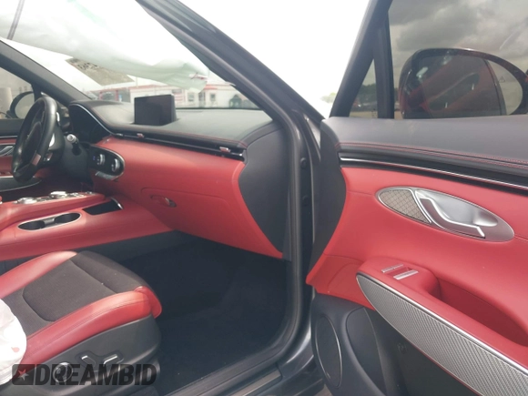 2023 Genesis GV70 2.5T with VIN KMUMADTBXPU094777, listed as a IAAI auction lot 42447363 with 31,683 mi miles and . Bid and sale history available at DreamBid. Image 5.