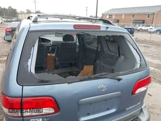 2001 Toyota Sienna LE with VIN 4T3ZF13C21U339020, listed as a IAAI auction lot 40836689 with 157,677 mi miles. Bid and sale history available at carsss.com. Image 6.