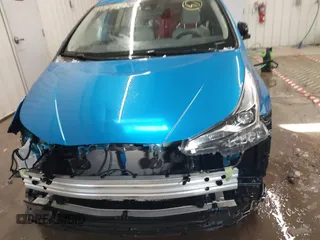 2021 Toyota Prius L Eco with VIN JTDKAMFU9M3135117, listed as a IAAI auction lot 41579736 with 35,795 mi miles and . Bid and sale history available at DreamBid. Image 13.