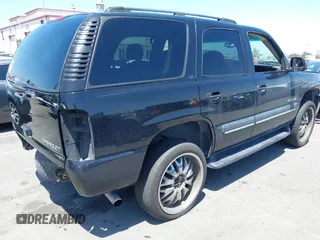 2003 Chevrolet Tahoe LS with VIN 1GNEC13T73R105540, listed as a IAAI auction lot 42313415 with Not provided miles and . Bid and sale history available at DreamBid. Image 4.