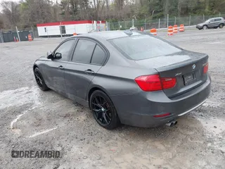 2013 BMW 3 Series 328i xDrive with VIN WBA3B3C56DF542509, listed as a IAAI auction lot 42010587 with 187,082 mi miles. Bid and sale history available at carsss.com. Image 3.