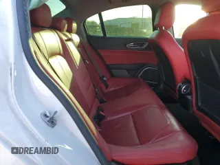 2018 Alfa Romeo Giulia z VIN ZARFAEBN6J7597943, wystawiony jako Copart lot #88288745 z przebiegiem 105 551 mil mil oraz Szkoda całkowita • Salvage title. Historia ofert i sprzedaży dostępna na DreamBid. Obrazek 10.