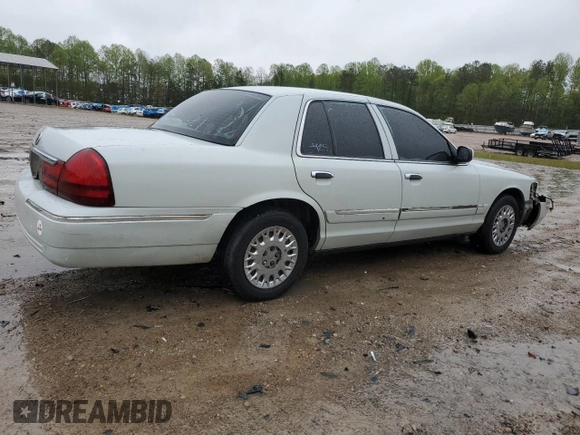 2003 Mercury Grand Marquis GS Convenience z VIN 2MEFM74W53X702387, wystawiony jako Copart lot #52852475 z przebiegiem 246 543 mil mil oraz Szkoda całkowita • Salvage title. Historia ofert i sprzedaży dostępna na DreamBid. Obrazek 3.