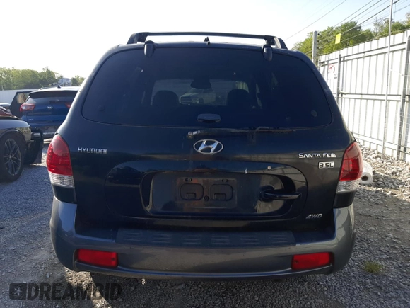 2005 Hyundai Santa Fe GLS with VIN KM8SC73E15U882999, listed as a Copart auction lot 69503144 with 0 mi miles and Salvage Title. Bid and sale history available at carsss.com. Image 6.