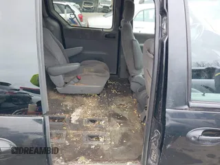 1999 Ford Windstar SE with VIN 2FMDA5243XBC41132, listed as a IAAI auction lot 41575559 with 240,497 mi miles and . Bid and sale history available at carsss.com. Image 8.