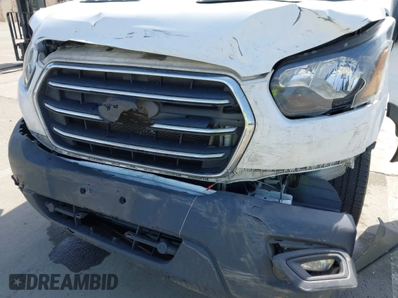 2020 Ford Transit Cargo with VIN 1FTBR1Y80LKA67205, listed as a IAAI auction lot 41805459 with 184,186 mi miles and . Bid and sale history available at DreamBid. Image 6.