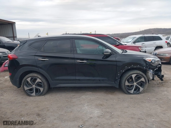 2016 Hyundai Tucson Eco with VIN KM8J3CA25GU257036, listed as a IAAI auction lot 41453539 with 68,235 mi miles. Bid and sale history available at carsss.com. Image 14.