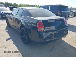 2013 Chrysler 300 with VIN 2C3CCAAGXDH660851, listed as a IAAI auction lot 41970721 with 112,017 mi miles and . Bid and sale history available at carsss.com. Image 3.