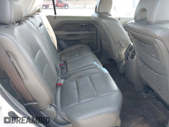 2006 Honda Pilot EX-L with VIN 2HKYF18746H517810, listed as a IAAI auction lot 41990178 with 184,679 mi miles and . Bid and sale history available at DreamBid. Image 8.