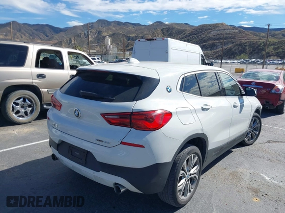 2020 BMW X2 sDrive28i with VIN WBXYH9C01L5P01913, listed as a IAAI auction lot 41591563 with 65,271 mi miles. Bid and sale history available at carsss.com. Image 4.
