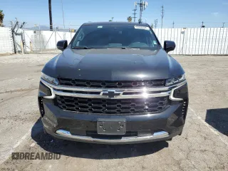 2023 Chevrolet Suburban LS z VIN 1GNSKBKD0PR129979, wystawiony jako Copart lot #53000485 z przebiegiem 68 896 mil mil oraz Czysty tytuł • Clean title. Historia ofert i sprzedaży dostępna na DreamBid. Obrazek 5.