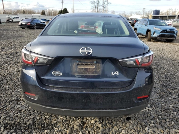 2016 Scion iA z VIN 3MYDLBZV8GY109570, wystawiony jako Copart lot #43939715 z przebiegiem 11 608 mil mil oraz Szkody całkowita. Historia ofert i sprzedaży dostępna na DreamBid. Obrazek 6.