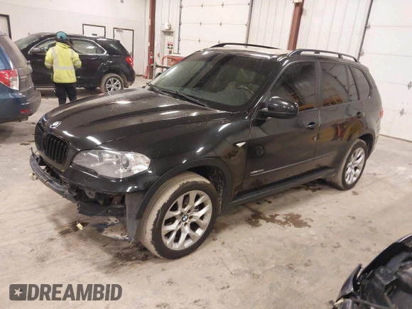 2012 BMW X5 35i with VIN 5UXZV4C55CL990510, listed as a IAAI auction lot 41849293 with 117,522 mi miles and . Bid and sale history available at DreamBid. Image 17.