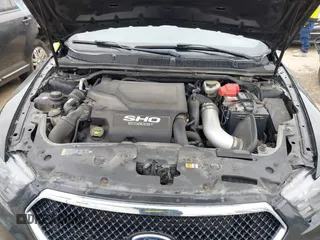 2016 Ford Taurus SHO with VIN 1FAHP2KT2GG100643, listed as a IAAI auction lot 42277356 with 113,215 mi miles and . Bid and sale history available at DreamBid. Image 10.