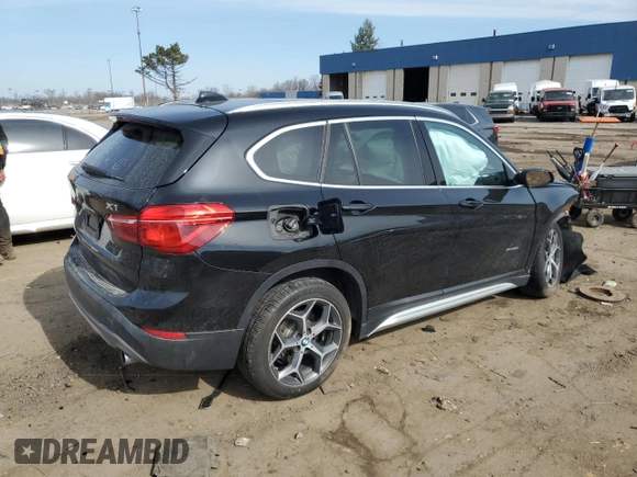 2018 BMW X1 xDrive28i with VIN WBXHT3C31J5K25021, listed as a Copart auction lot 48779555 with 71,741 mi miles and Salvage Title. Bid and sale history available at carsss.com. Image 3.