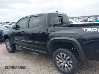 2017 Toyota Tacoma SR5 with VIN 5TFAZ5CN8HX052459, listed as a IAAI auction lot 41495281 with 212,314 mi miles and . Bid and sale history available at DreamBid. Image 14.