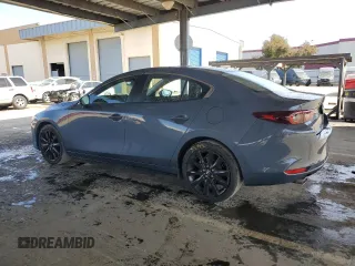 2025 Mazda 3 S Carbon Edition with VIN JM1BPBCM5S1775311, listed as a Copart auction lot 52108395 with 2,390 mi miles and Non Repairable. Bid and sale history available at DreamBid. Image 2.